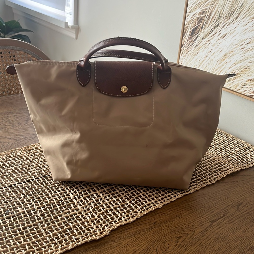 Longchamp tote tan color used but in great shape